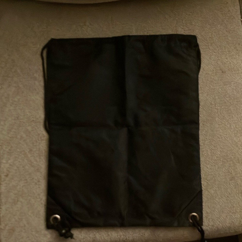 Black Drawstring Backpack With Decorative Design - image 3